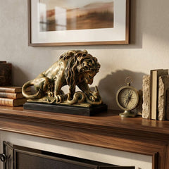Bronze lion statue on a wooden mantelpiece with books and a clock.
