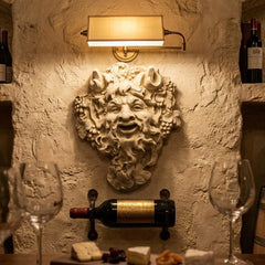 Wine cellar with wine bottles, glasses, and a decorative wall mask Wall Bacchus 10 Small Wall Plaque Sculpture