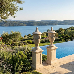 Luxury pool area with scenic view of water and mountains