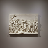 Relief sculpture on a wall in an art gallery