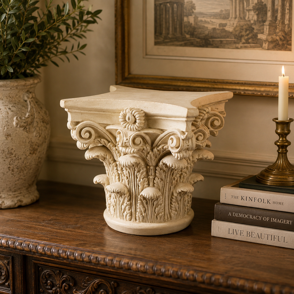 Decorative column on a wooden table with books and a candle