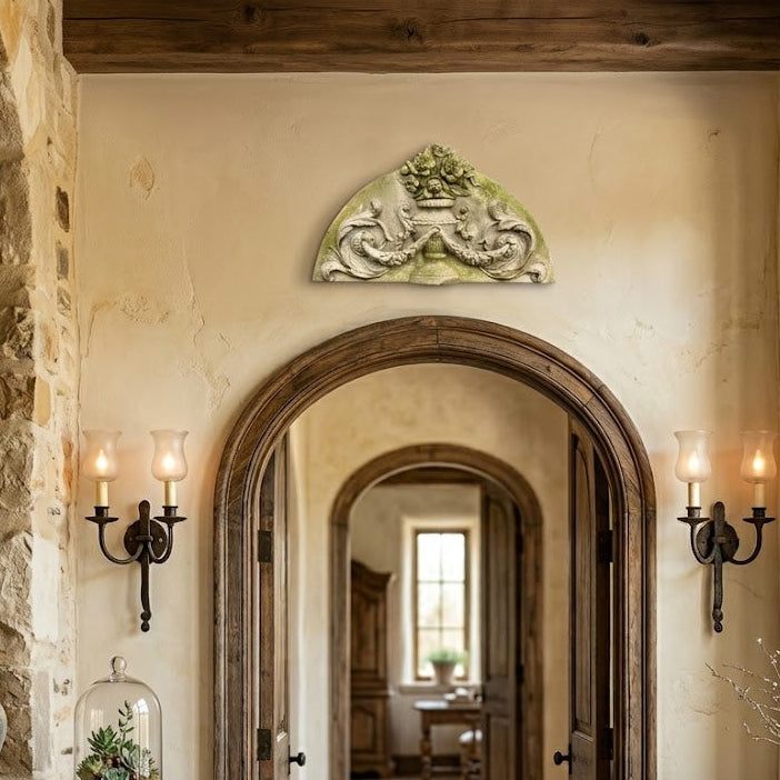 Stately hallway with stone walls, wooden arches, and decorative elements.