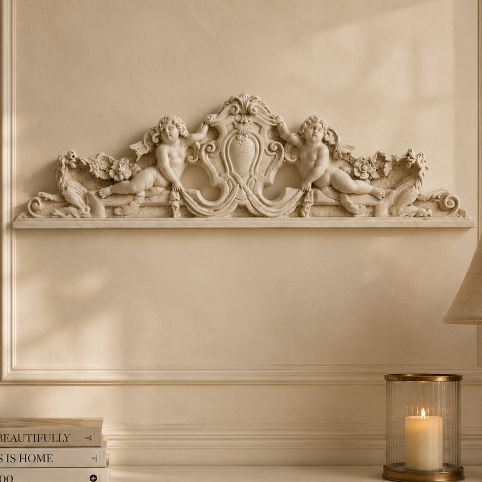 Decorative wall piece above a shelf with books, a candle, and a lamp.