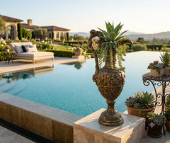 Florentine Pitcher Garden.  Decorative urn with plants by a poolside in a luxurious garden setting