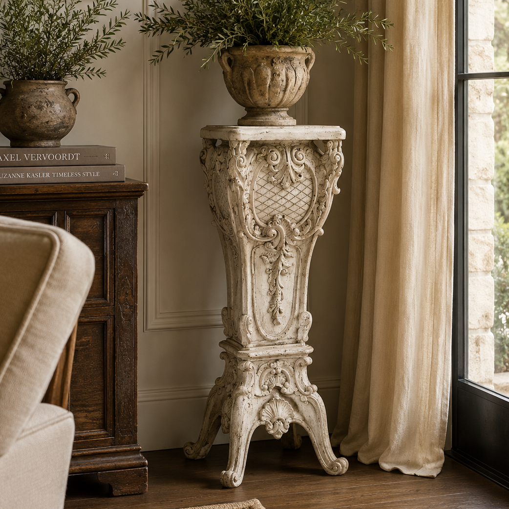 Decorative pedestal with potted plants in a living room setting
