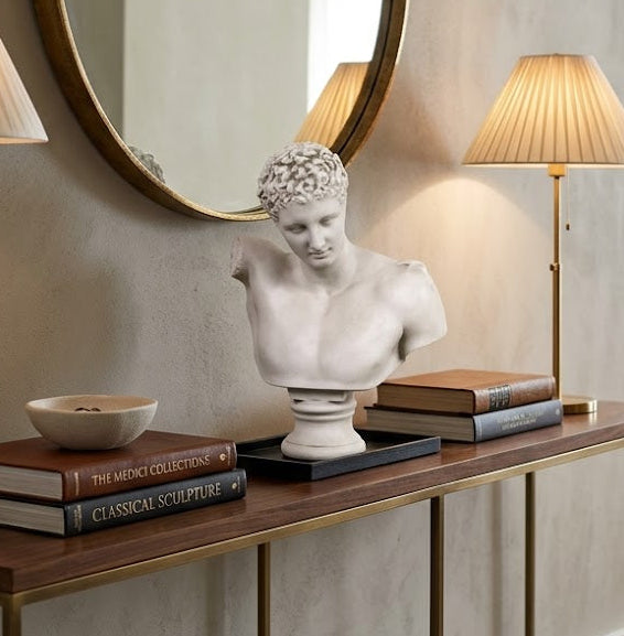 Console table with decorative items in a living room setting