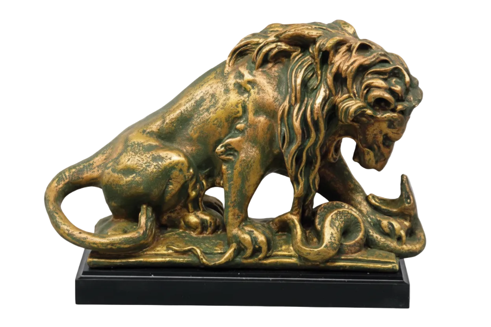 Bronze lion statue on a white background