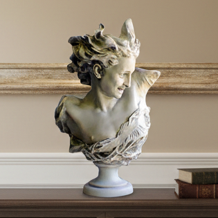 A classical-style bust sculpture of a woman with flowing hair, displayed on a dark wood console table against a beige wall with a large framed picture.