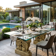 Outdoor dining area with a decorative table and chairs in a modern home setting.